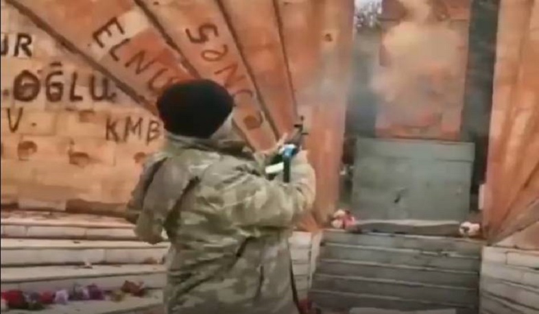Azerbaijani servicemen fires at Armenian cross-stone in Hadrut, Artsakh